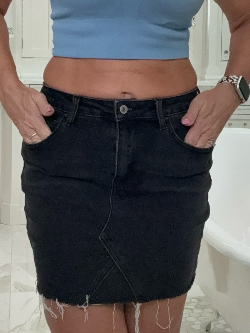 Black jean skirt size medium EUC distressed hem